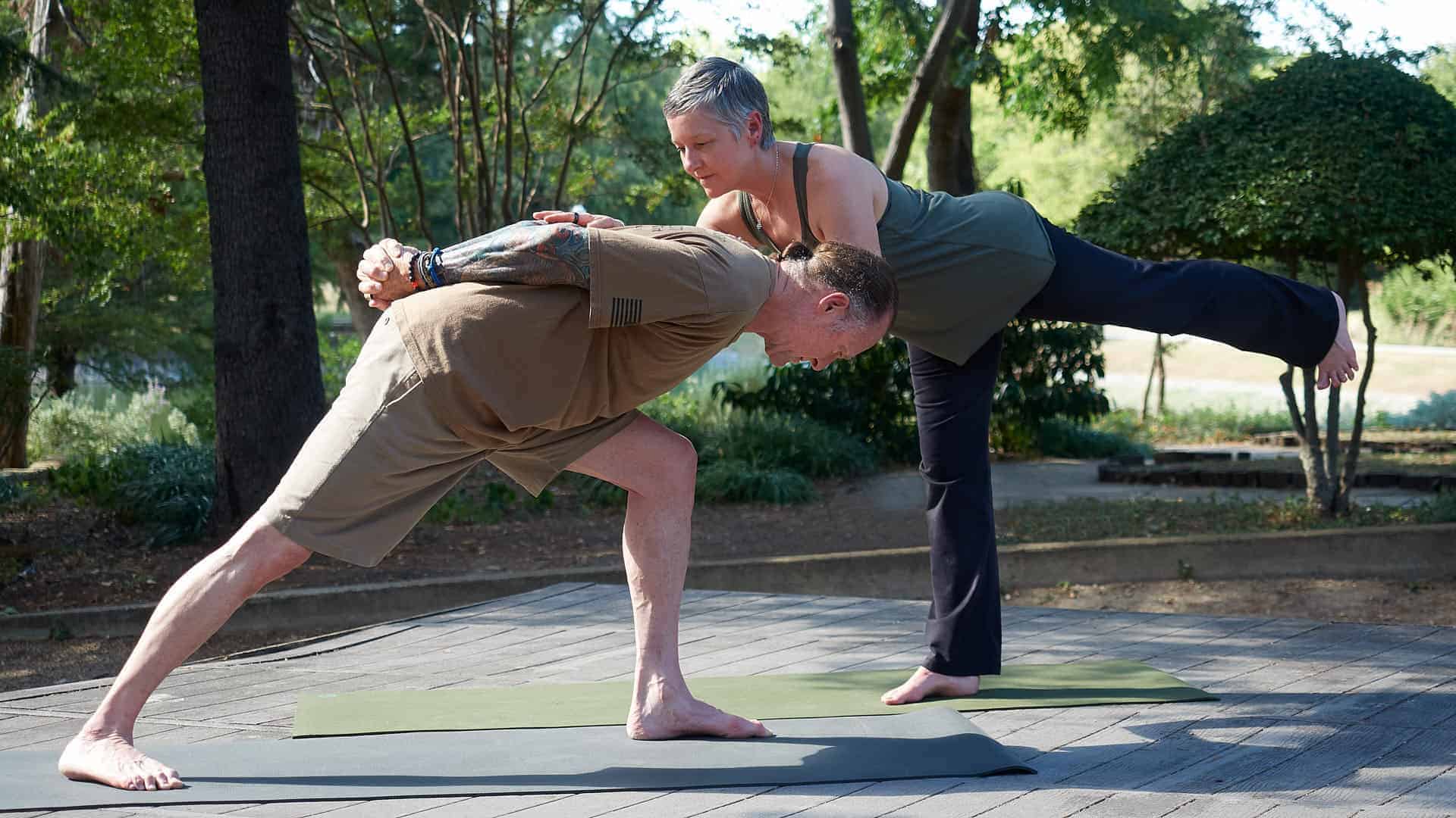 David and Charla Truesdale doing yoga.